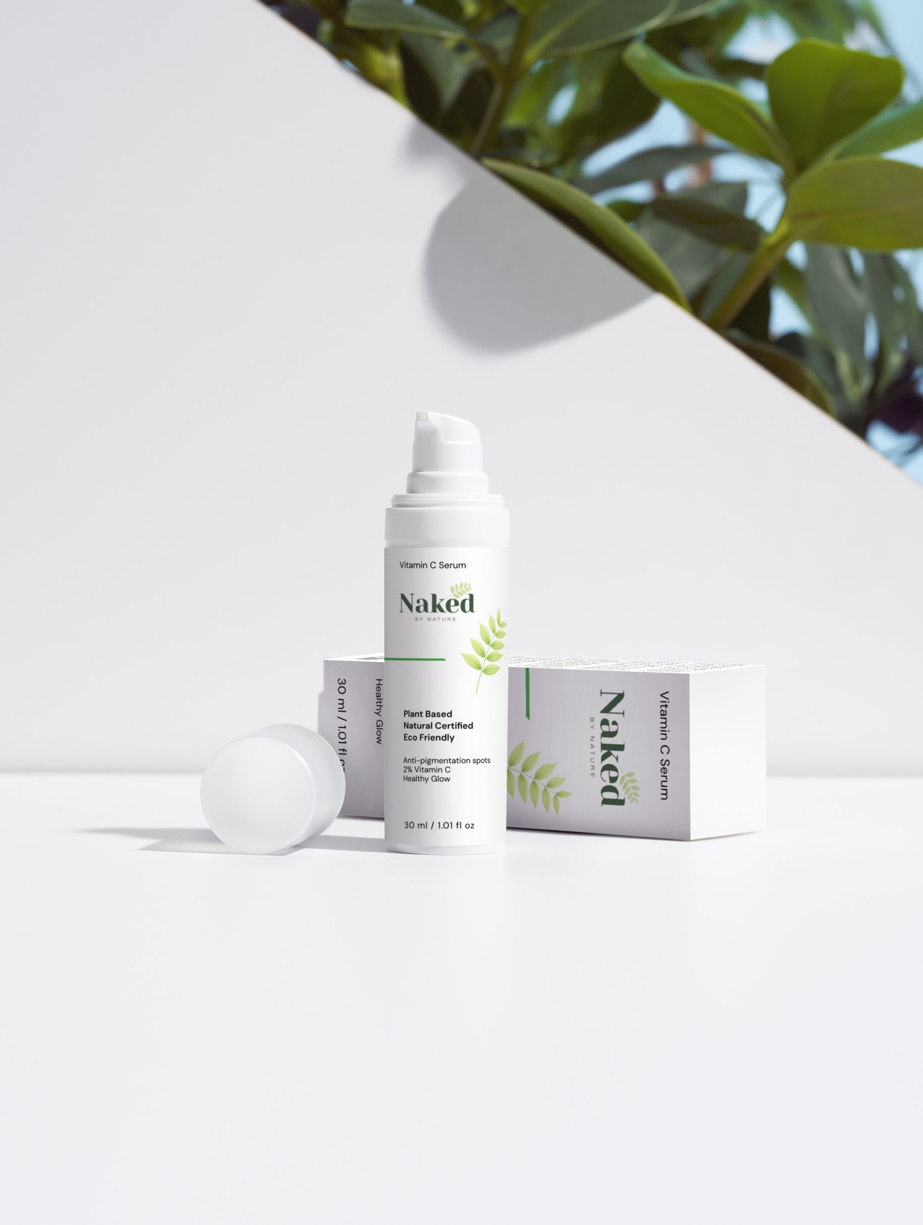 Plant-based Vitamin C serum for healthy glow, natural certified, eco-friendly skincare with green leaf design