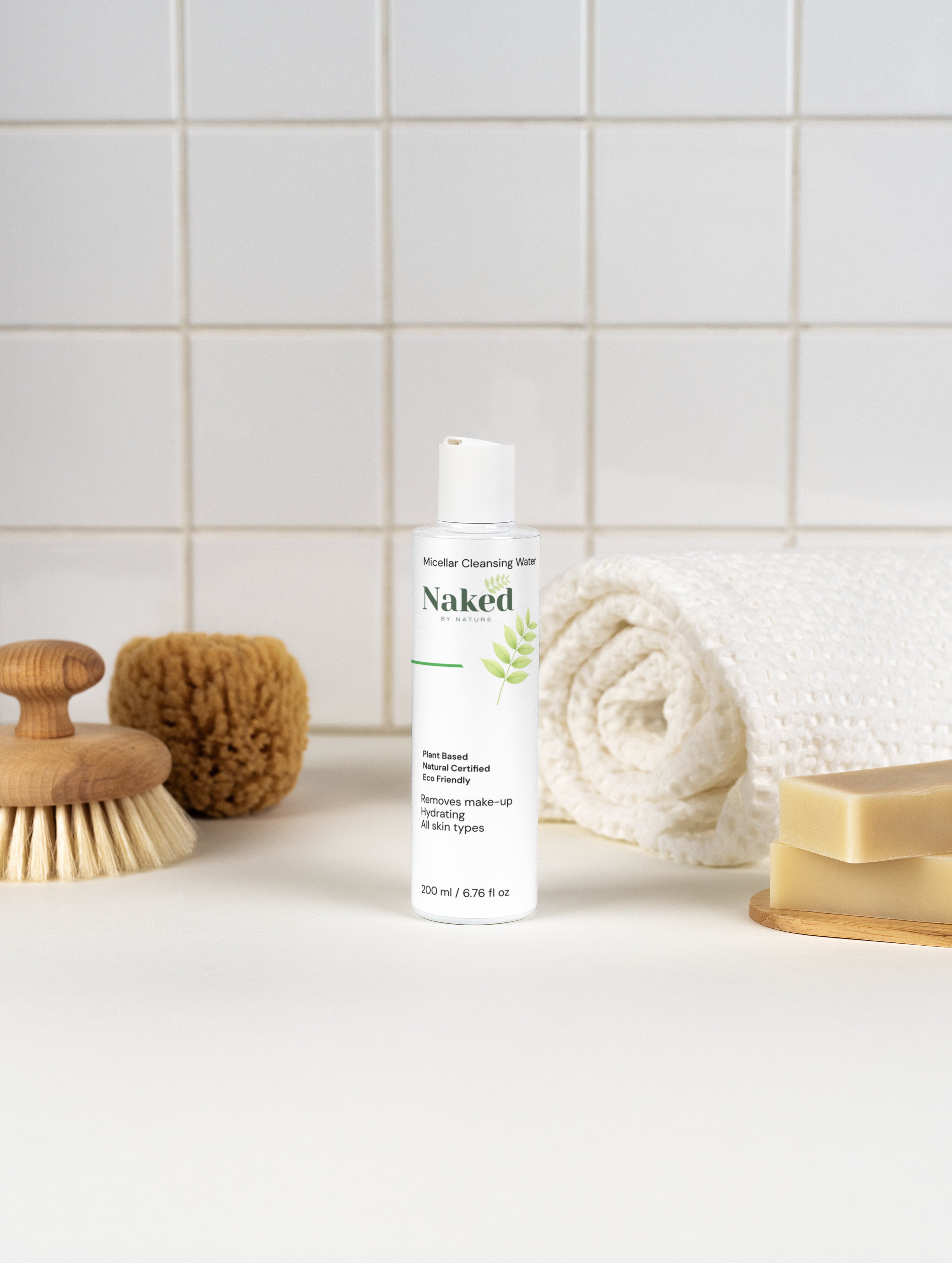 Plant-based micellar cleansing water for all skin types, eco-friendly & hydrating, with natural soap and brush