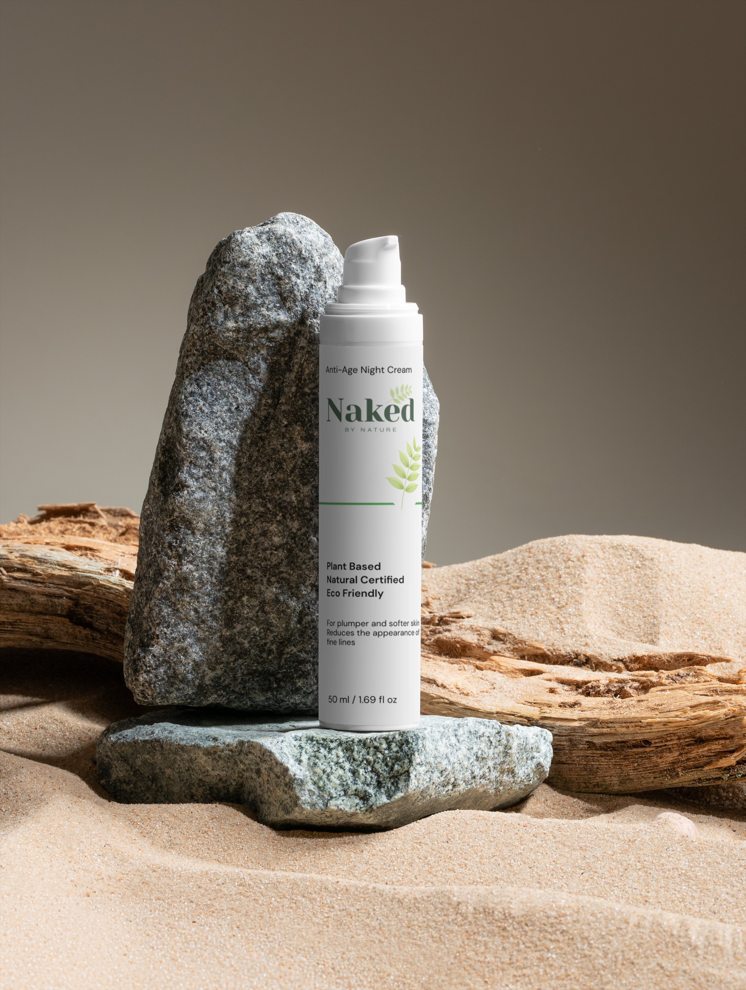Plant-based anti-age night cream in sand with rocks, natural certified eco-friendly skincare