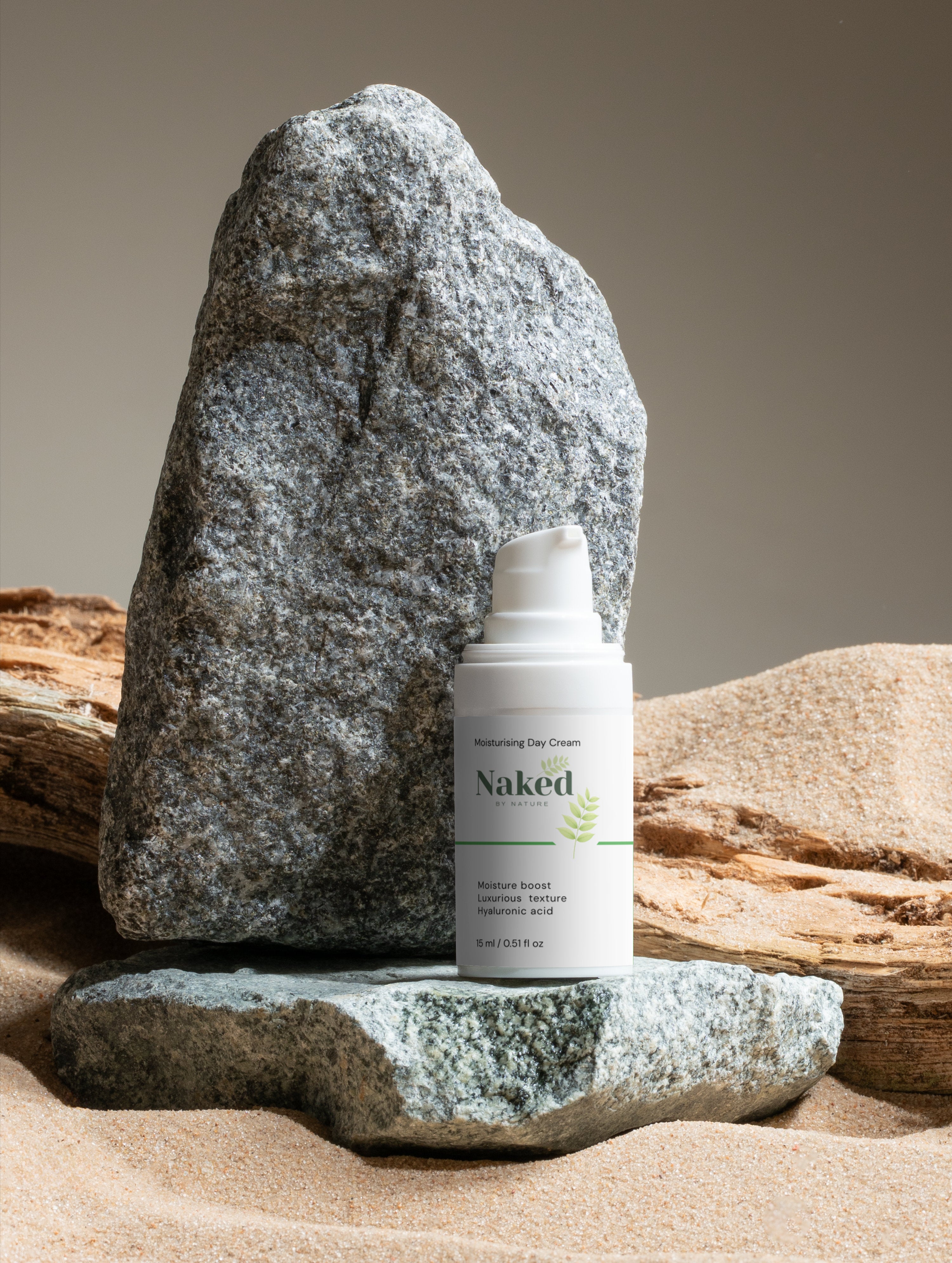 Moisturising Day Cream with hyaluronic acid, natural skincare in sandy, rocky setting