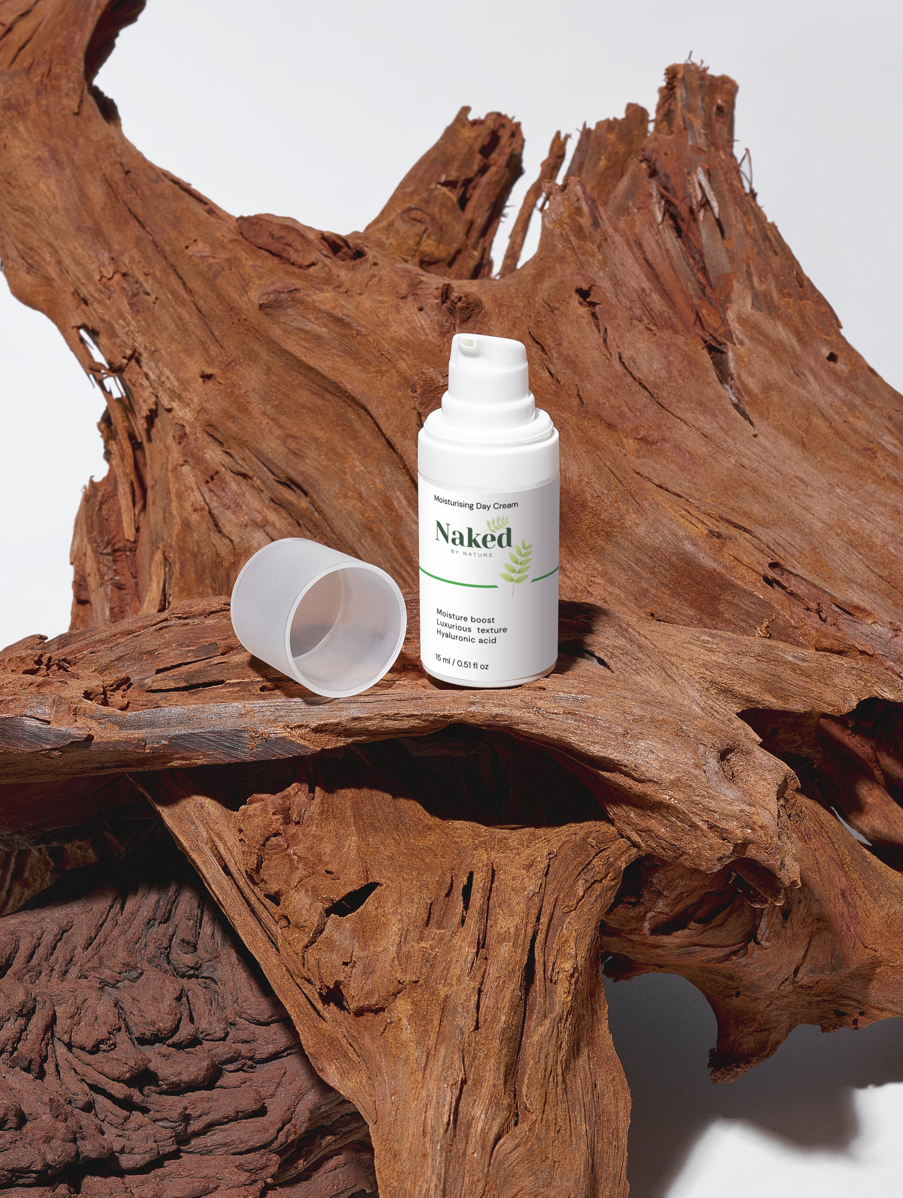 Moisturising Day Cream with hyaluronic acid on rustic wood, natural skincare for healthy skin